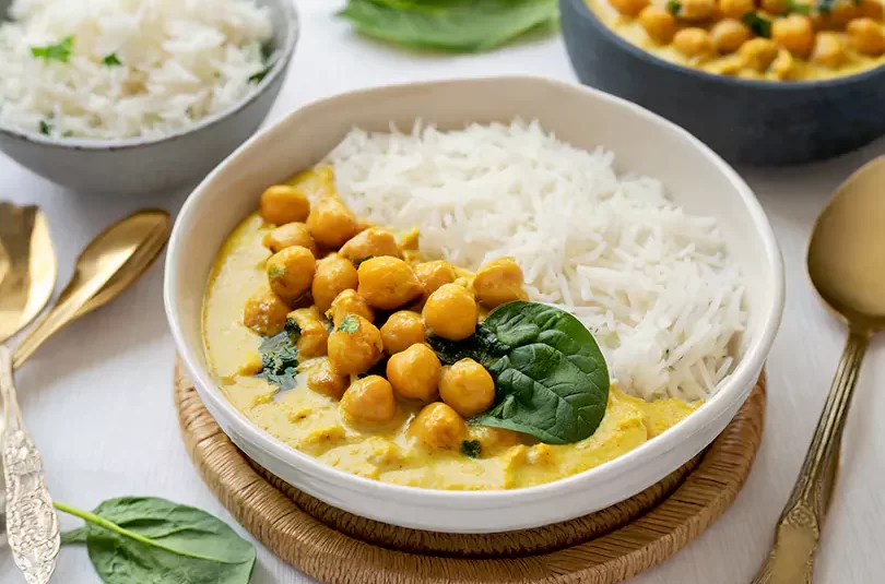 RecipeArtisan.com recipe to Spice Up Your Life: Creamy Coconut Korma with Chickpeas and Spinach (Vegan Delight!)
