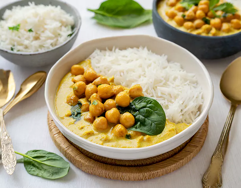 RecipeArtisan.com recipe to Spice Up Your Life: Creamy Coconut Korma with Chickpeas and Spinach (Vegan Delight!)