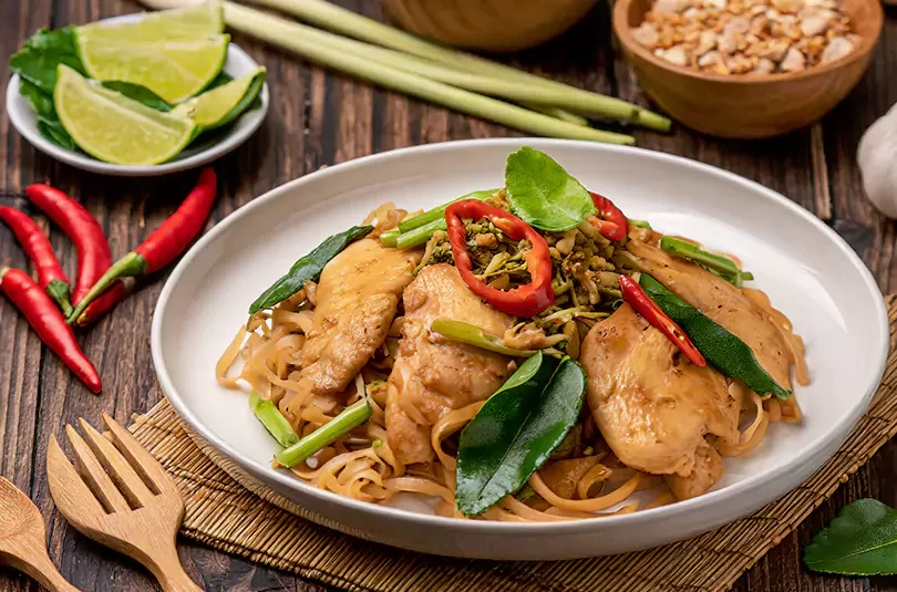 RecipeArtisan.com recipe for Spicy Thai Basil Chicken Stir-Fry with Pad See Ew Noodles